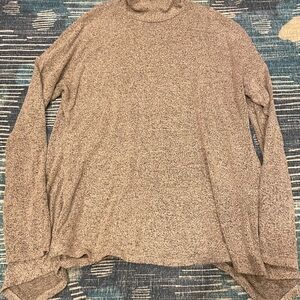 grey turtleneck sweater from the brand Green Envelope Los Angeles